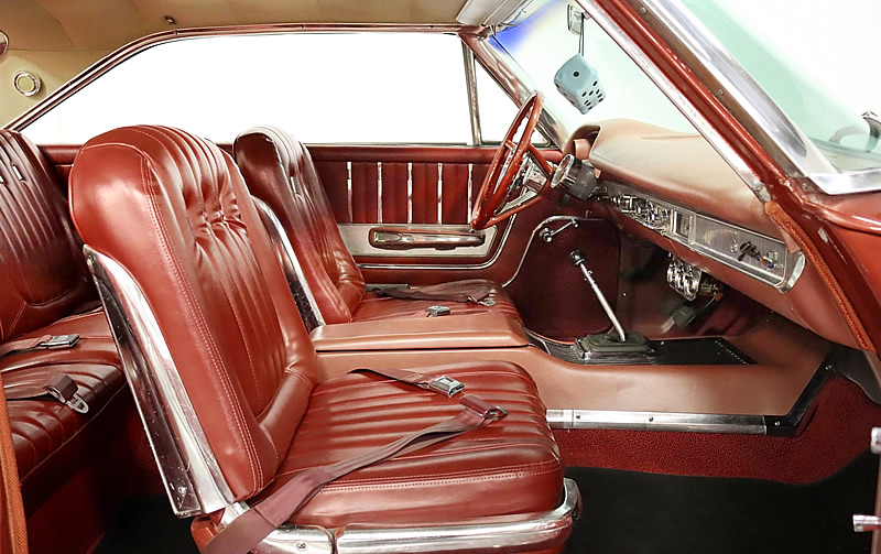 63 Galaxie 500 XL interior showing the bucket seats and 4-speed manual shifter