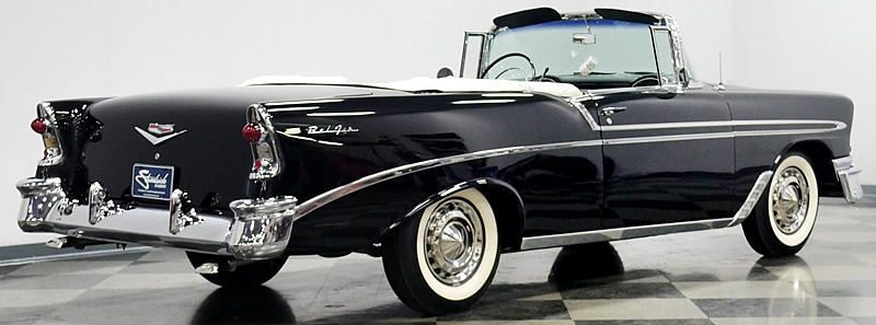 rear view of a 56 Chevy convertible with the top down