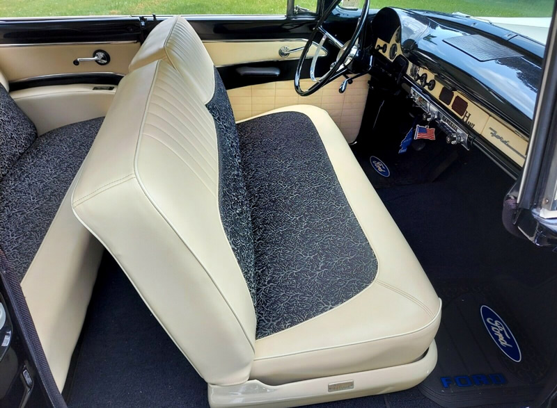 black cloth and white vinyl interior in a 56 Ford