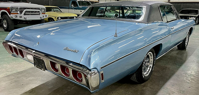 Rear view of a 68 Chevrolet Impala 427 showing the custom coupe roofline