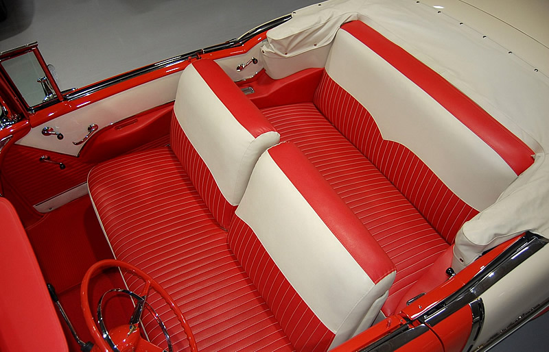 convertible top down showing the interior of a 1955 Chevy Bel Air convertible