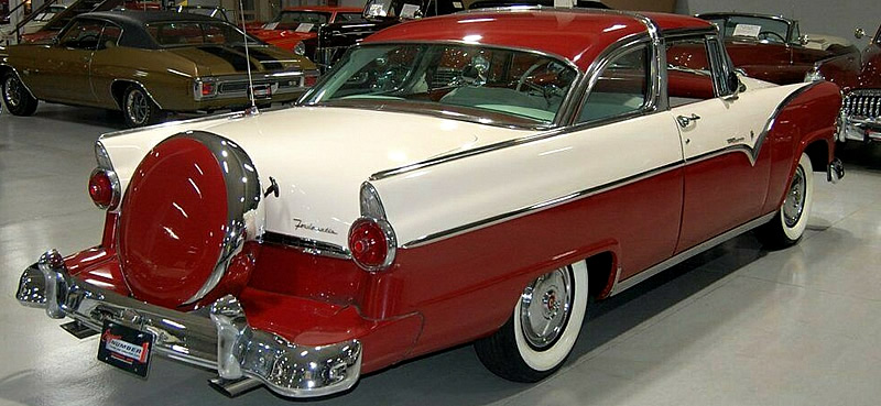 rear view of a 55 Ford Crown Victoria in Torch Red and Snowshoe White