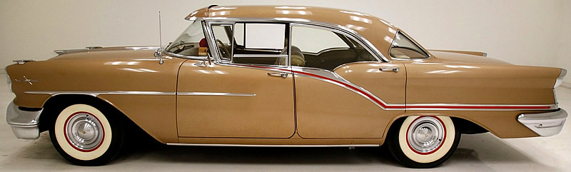 side view of a 57 Oldsmobile Ninety Eight 4-door Holiday hardtop