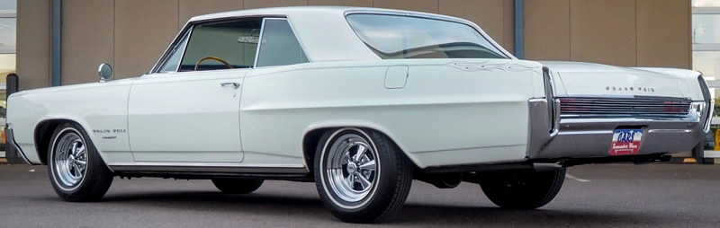 Rear view of a beautiful 1964 Pontiac Grand Prix in Cameo Ivory