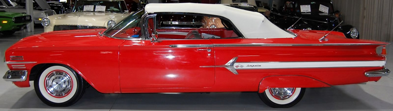 Side view of a 1960 Chevy Impala Convertible with the top up