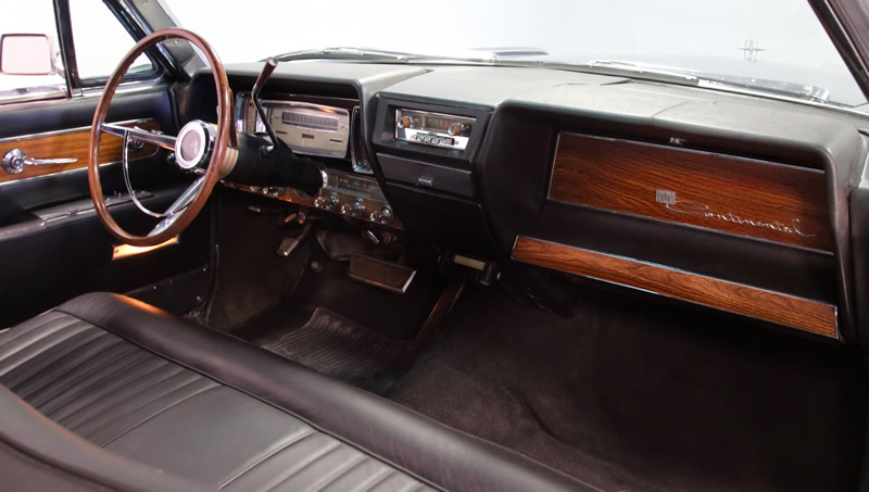 luxurious interior of a 62 Lincoln Continental