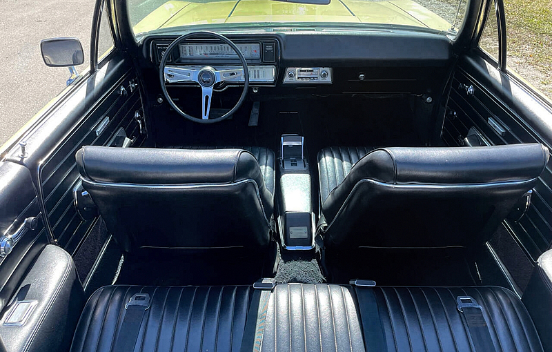 Black vinyl bucket seat interior of a 1968 Buick GS400 Convertible